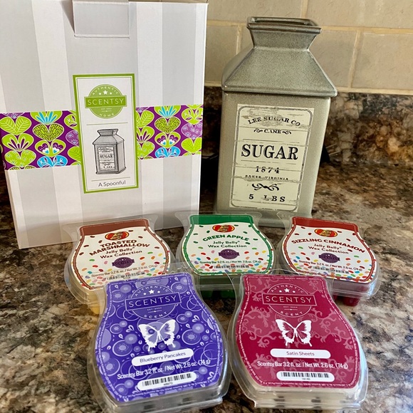 Scentsy “a spoonful” warmer and 5 scents